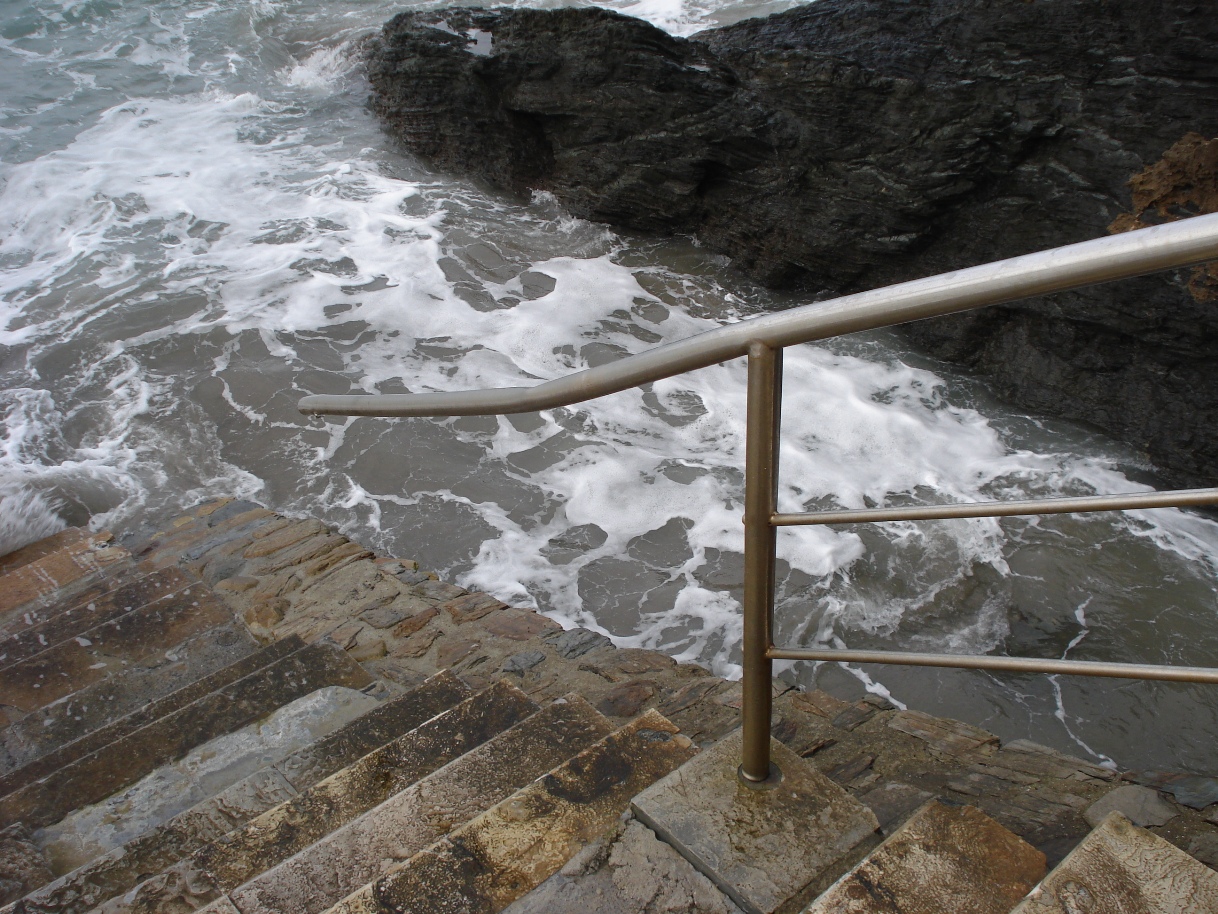 Reparación de daños en la playa de Arnao