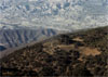 Paisajes erosivos en el sector central de la Cuenca del Almanzora, Almería, donde quedan ubicadas las parcelas experimentales de la RESEL: al fondo los modelados áridos-semiáridos de badlands (parcelas de Albox, nº 21), en primer plano las vertientes septentrionales de la Sierra de Los Filabres, con clima subhúmedo (parcelas de Geva, nº 26 y 27).