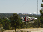 Fotografia de un helicóptero transportando Brigadas BRIF I aerotransportadas